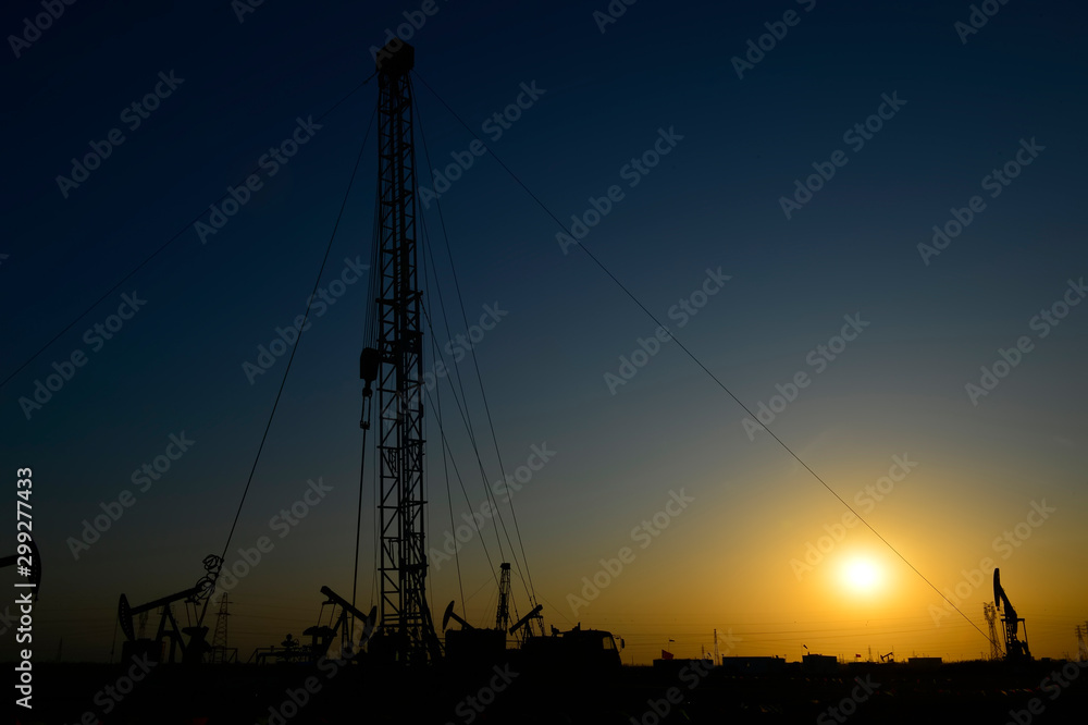 Fototapeta premium The oil workers in the job
