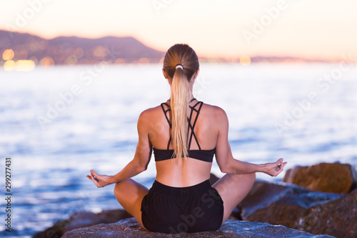 Female is meditating