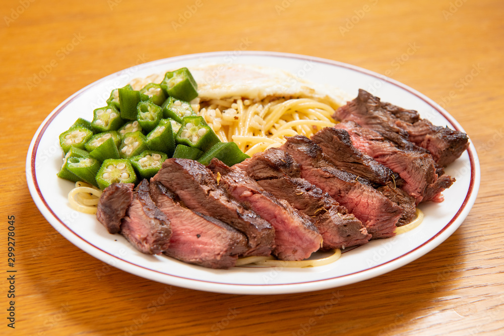 Steak spaghetti, (garlic, poached egg, okra, steak)