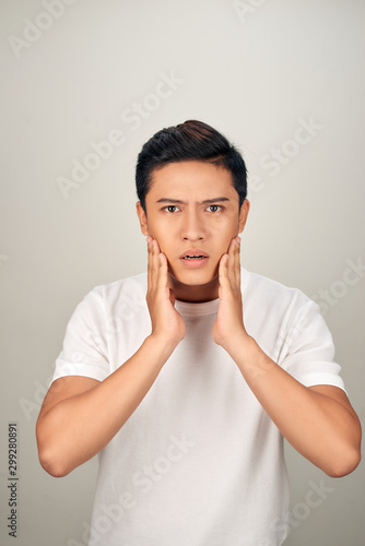 Asian man surprised emetion on white background