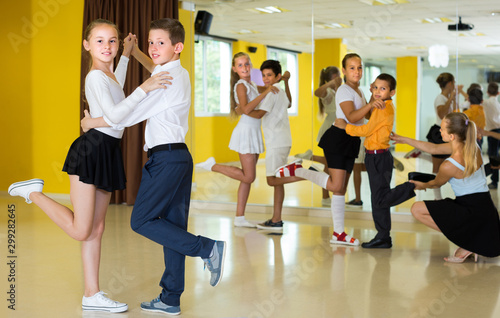 Fototapeta Naklejka Na Ścianę i Meble -  Pairs of kids are dancing tango