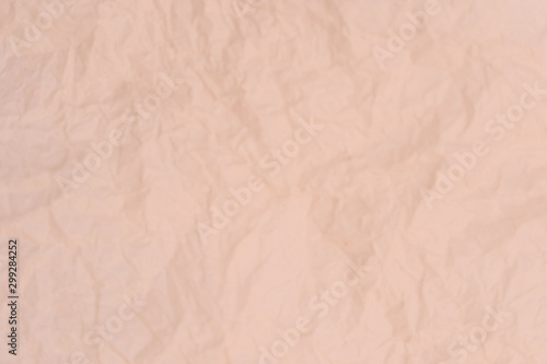 Crumpled paper texture, abstract background. Fashionable modern shade. Copy space, soft focus.