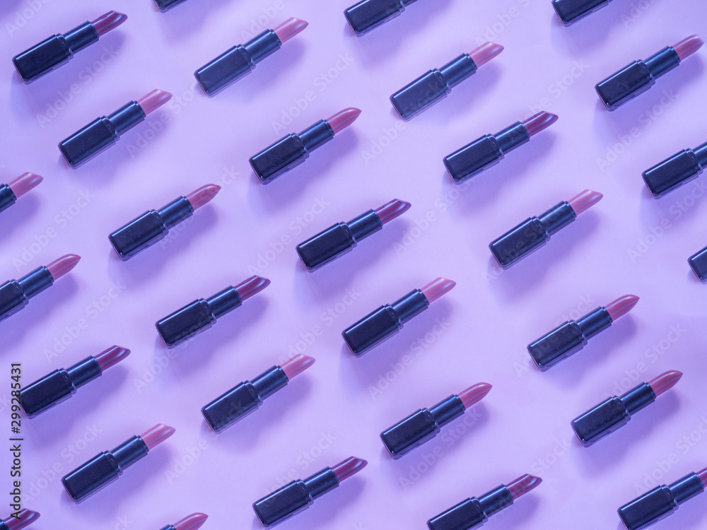 Lipstick pattern on purple background Lipstick pattern on purple background