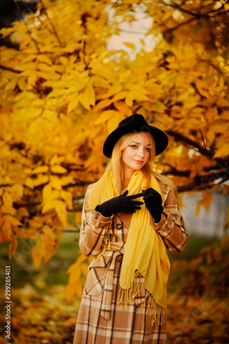 Attractive young woman in an autumnal shot outdoors.