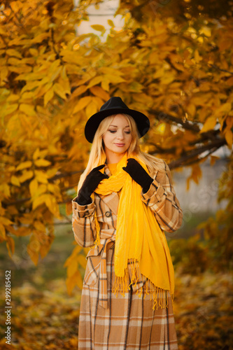 Attractive young woman in an autumnal shot outdoors.
