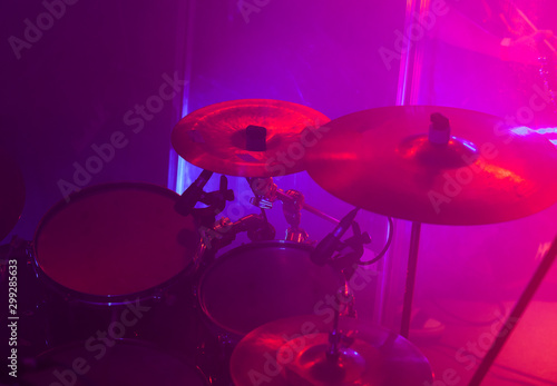 Rock band drum set in purple lights