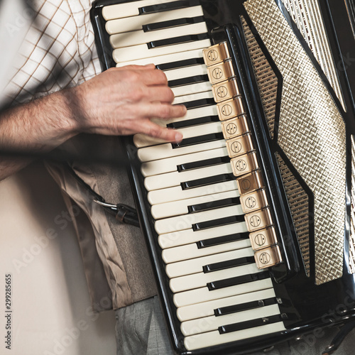 Accordionist plays vintage accordion