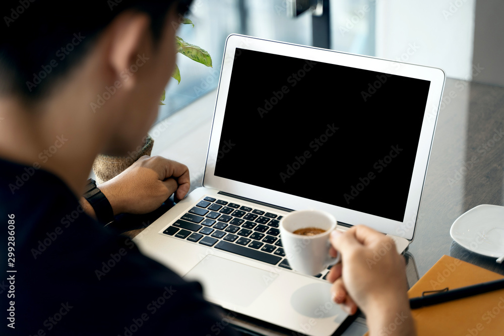 man using labtop man using labtop