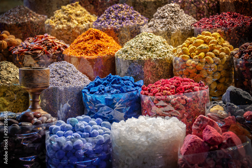 Photography Colorful piles of spices in Dubai souks, United Arab Emirates