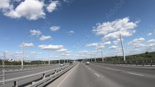 Video of driving on highway along a Bugrinsky bridge over river Ob in Novosibirsk photo