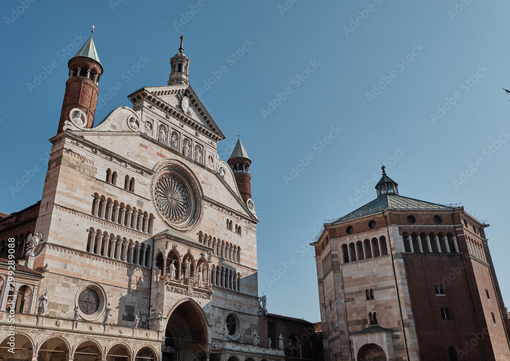 Cremona Cathedral with the adjoining baptistery and famous Torrazzo bell tower- market square Piazza Duomo, Lombardy, Italy-