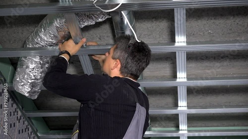 man mount ceiling profiles. Ventilation tube duct hidden under ceiling