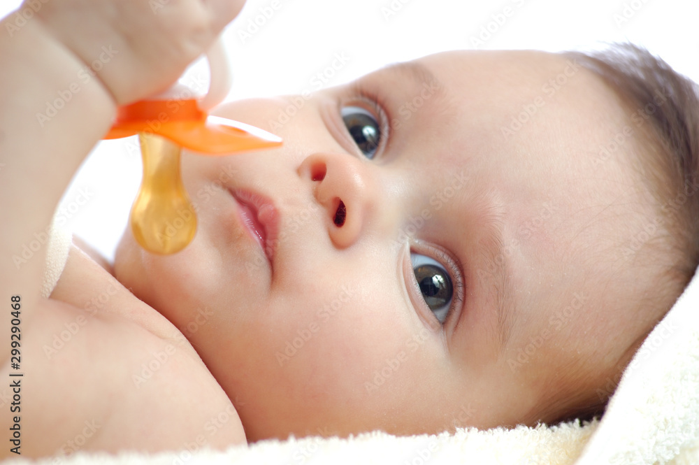 Close-up portrait of a little baby with dummy Close-up portrait of a little baby with dummy