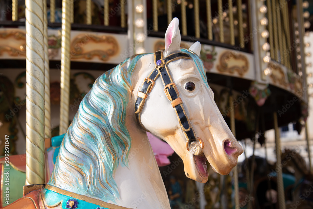 Colorful wooden horse of a children circus carousel
