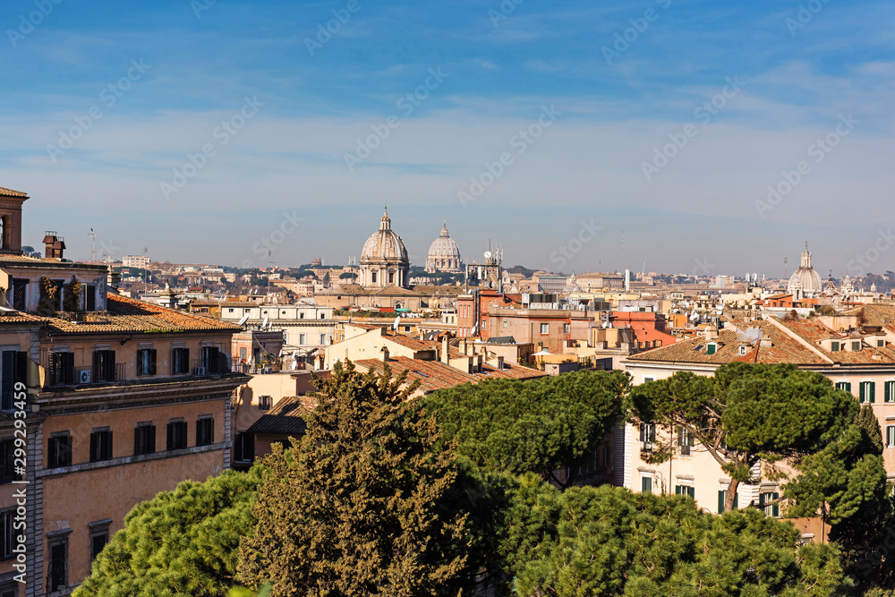 Rome rooftop city view and dome St. Peter's cathedral. Italy