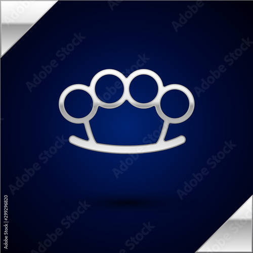 Silver Brass knuckles icon isolated on dark blue background. Vector Illustration