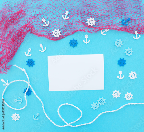 Frame made of rope with fishing net and an anchor. Summer time sea vacation concept. Place for your text.