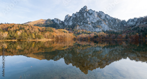 Stunning view of the Katzenstein reflecting in the crystal clear water of the Laudachsee near Gmunden, OÖ, Austria