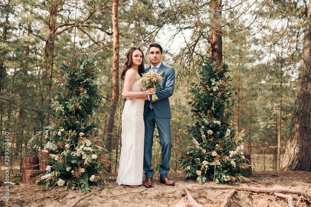 Bride and groom posing at country side Bride and groom posing at country side