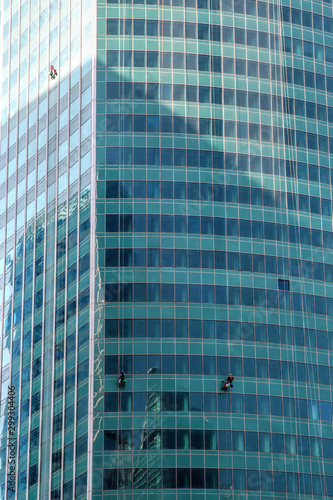   limbers wash windows and glass facade of the skyscraper. Moscow city  Moscow International Business Center    Russia