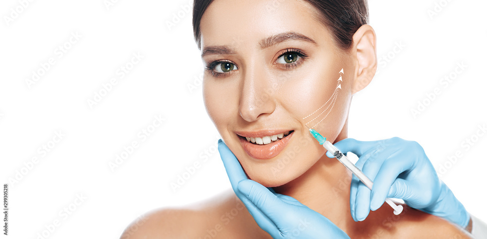 beautiful woman received procedure lifting skin. Injections with lifting arrows isolated on white