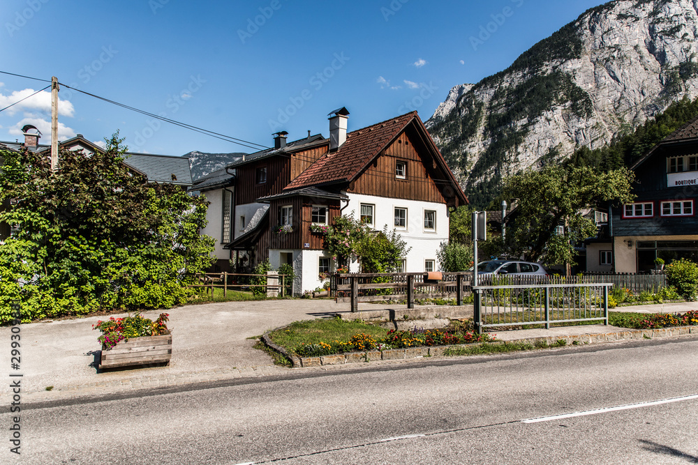 Hallstadt, Austria - July, 2019: Hallstatt village Austria. Tourist destination. Hallstadt, Austria - July, 2019: Hallstatt village Austria. Tourist destination.