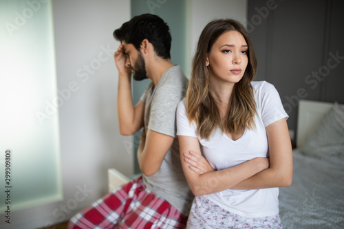 Leinwand Poster Couple having arguments and sexual problems in bed