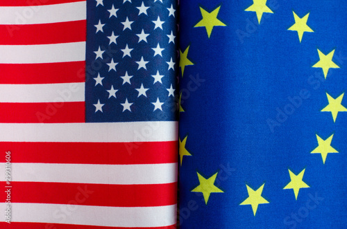 the flags of the United States and the European Union closeup concept