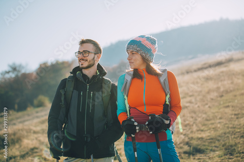 Couple hikers on a mountaintop