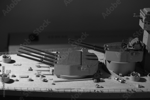 A close up of two front main gun turrets on a World War II battleship mode