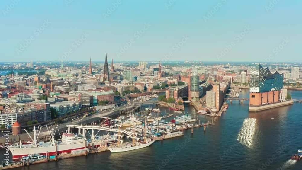 Spectacular view from the top to the urban landscape Hamburg City and Port of Hamburg on a sunny day with a clear cloudless sky in the sunset time Spectacular view from the top to the urban landscape Hamburg City and Port of Hamburg on a sunny day with a clear cloudless sky in the sunset time