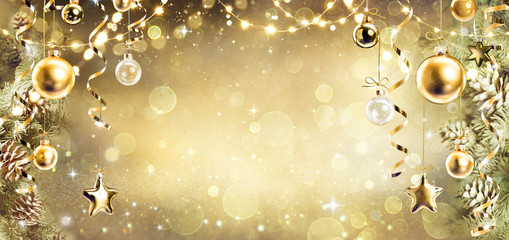 Christmas Background With Vintage Golden Ornament Hanging On Fir Branches