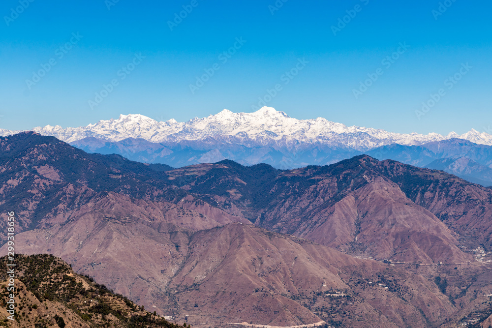 huge mountains snowy mountain peaks of the Garhwal Himalayas namely Banderpooch, Swargrohini, Gangotri Group, Yamunotri and Nanda Devi are clearly visible from here.