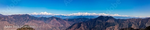 huge mountains snowy mountain peaks of the Garhwal Himalayas namely Banderpooch, Swargrohini, Gangotri Group, Yamunotri and Nanda Devi are clearly visible from here. photo