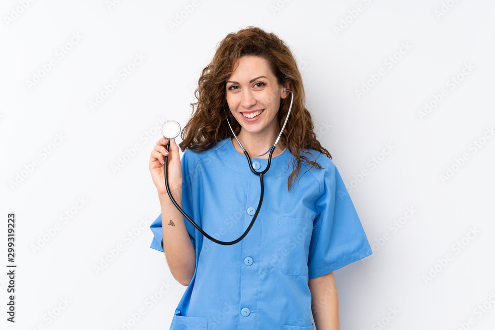 Young pretty woman over isolated background with doctor gown Young pretty woman over isolated background with doctor gown