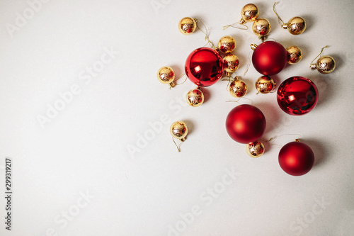 Christmas ornaments on the white background isolated. Red and golden christmas balls.