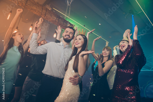 Nice attractive luxury stylish trendy gorgeous cheerful cheery glad company guys students having fun active social night life evening occasion at fashionable modern nightclub indoors