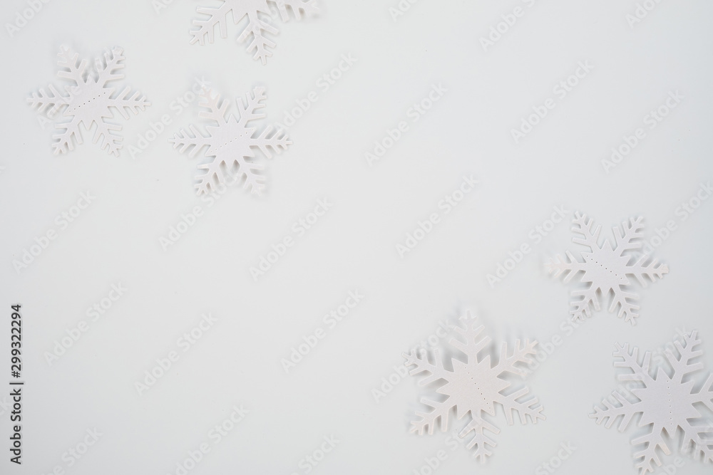 Christmas composition. Christmas frame made of snowflakes on white background. Winter concept. Flat lay, top view, copy space . Christmas composition. Christmas frame made of snowflakes on white background. Winter concept. Flat lay, top view, copy space .