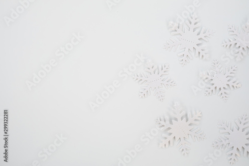 Christmas composition. Christmas frame made of snowflakes on white background. Winter concept. Flat lay, top view, copy space .