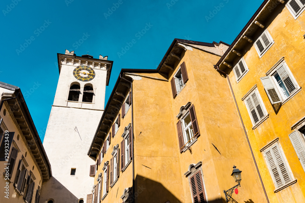 Colorful houses and tower with clock in  Rovereto, Italy
