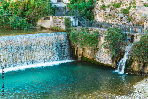 Waterfall and river Adige in  Rovereto  Italy