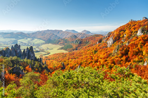 Brightly colored forests of mountains at autumn. National Nature Reserve Sulov Rocks, Slovakia, Europe.