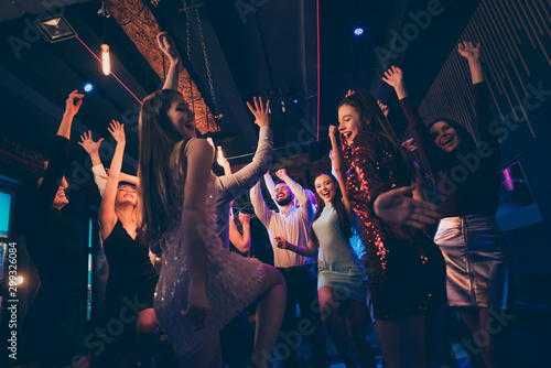 Portrait of cheerful positive youth people have fun on discotheque dance feel crazy on festive events wearing formalwear dress outfit