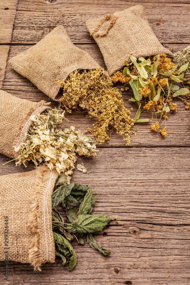 Herbal harvest collection and bouquets of wild herbs. Alternative medicine. Natural pharmacy, self-care concept Herbal harvest collection and bouquets of wild herbs. Alternative medicine. Natural pharmacy, self-care concept