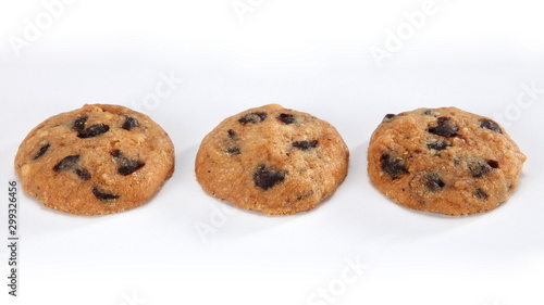 A cookie is a baked food that is typically small, flat and sweet. It usually contains flour, sugar and some type of oil or fat. It may include other ingredients such as raisins, oats, chocolate.