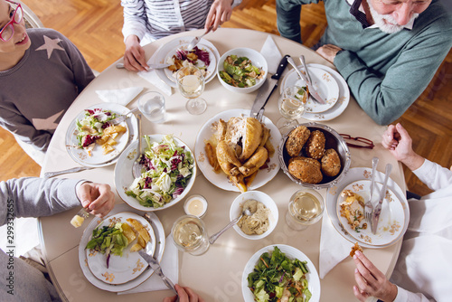 Family gathered over for Christmas holidays, celebrating, having lunch  photo