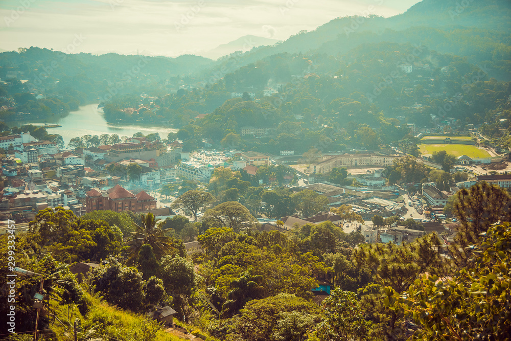 Beautiful top city view of Kandy. Sri Lanka tourism. Ceylon travel. Ecotourism concept. Town in jungle. Mountains landscape. Asia background horizontal. Foggy cityscape. Copy space