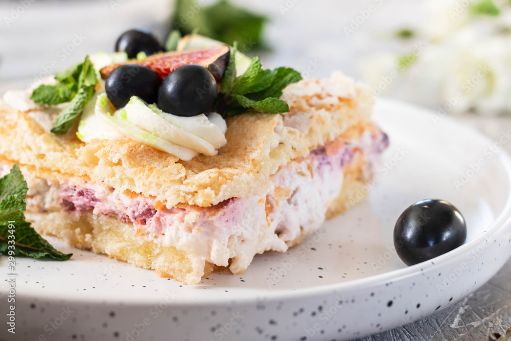 Pavlova on a biscuit with a gentle curd cream and fruit. Pavlova on a biscuit with a gentle curd cream and fruit.