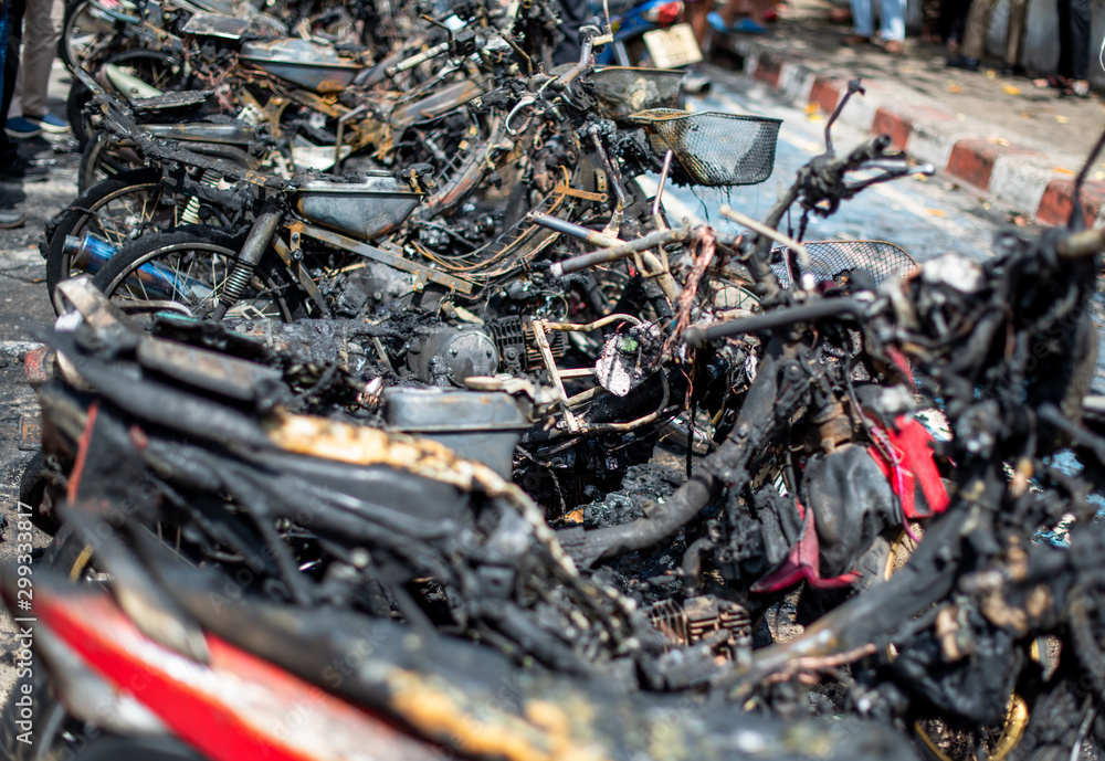 Terrorists set fire to motorbikes on a street in the city. Terrorists set fire to motorbikes on a street in the city.