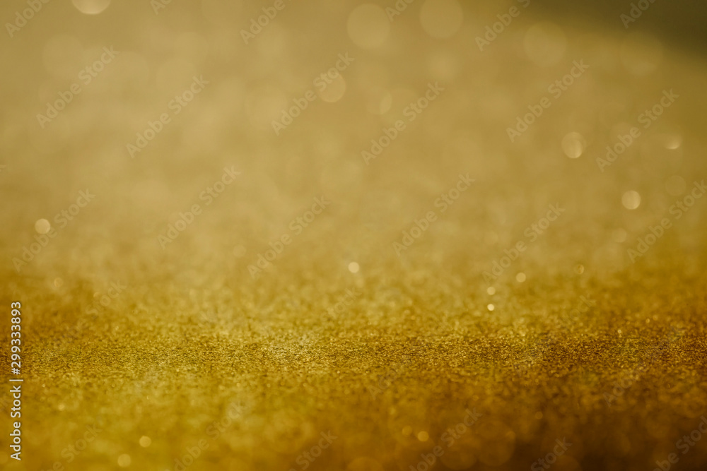 Golden sparkling bokeh christmas abstract backdrop Golden sparkling bokeh christmas abstract backdrop
